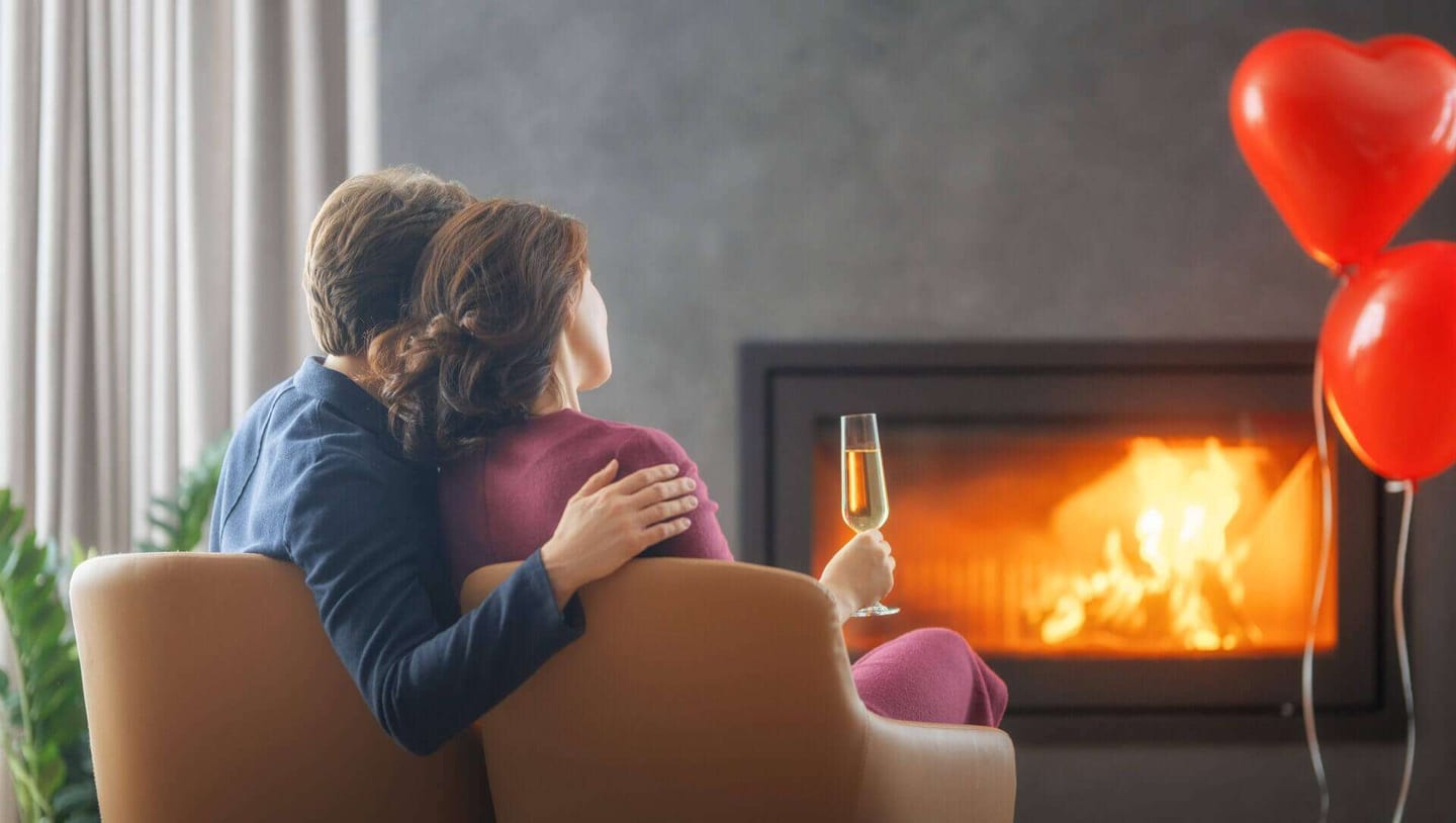 Couple celebrating valentine's day while enjoying their clean and nice house.