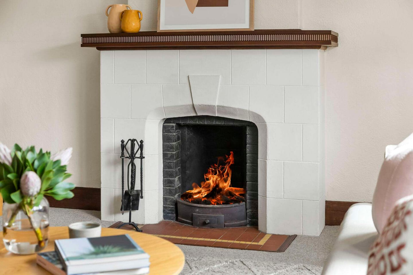 A cleaned fireplace ready for a cozy winter