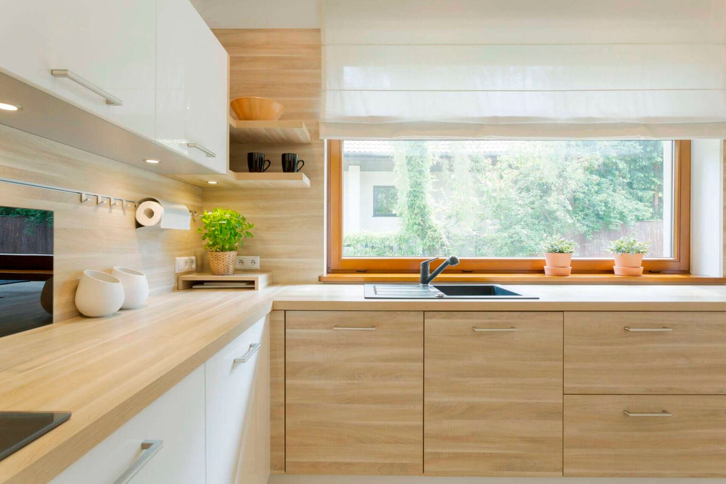 A pristine looking kitchen after learning how to clean kitchen cabinets