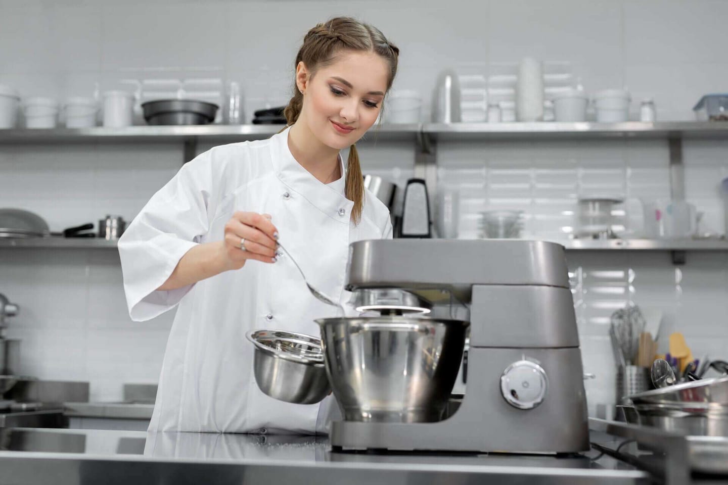 A cook learning how to clean stainless steel appliances
