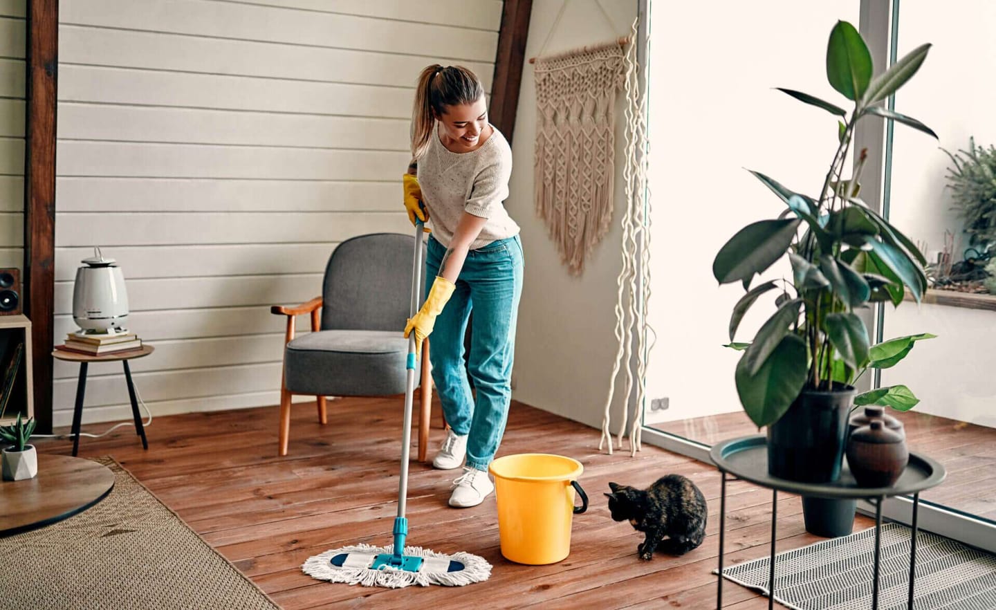 Woman cleaning her house